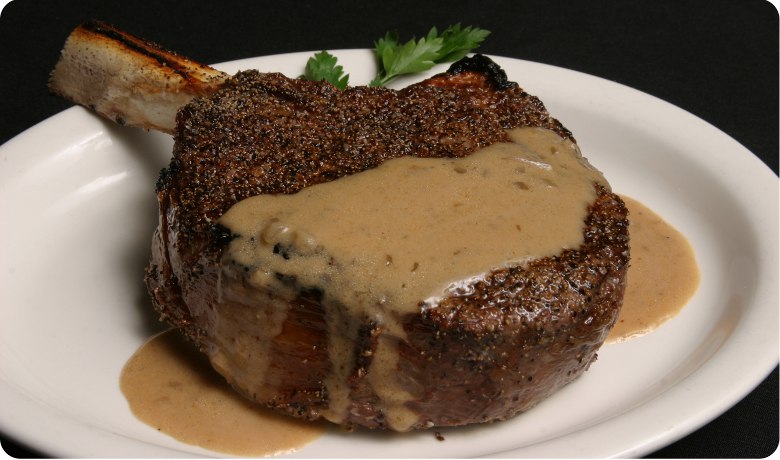 A view of the water and wine from inside of Four Winds Steakhouse.