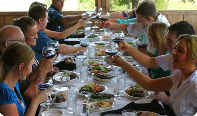 A view of the water and wine from inside of Four Winds Steakhouse.